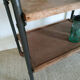 Serving table on metal wheels and antique wood