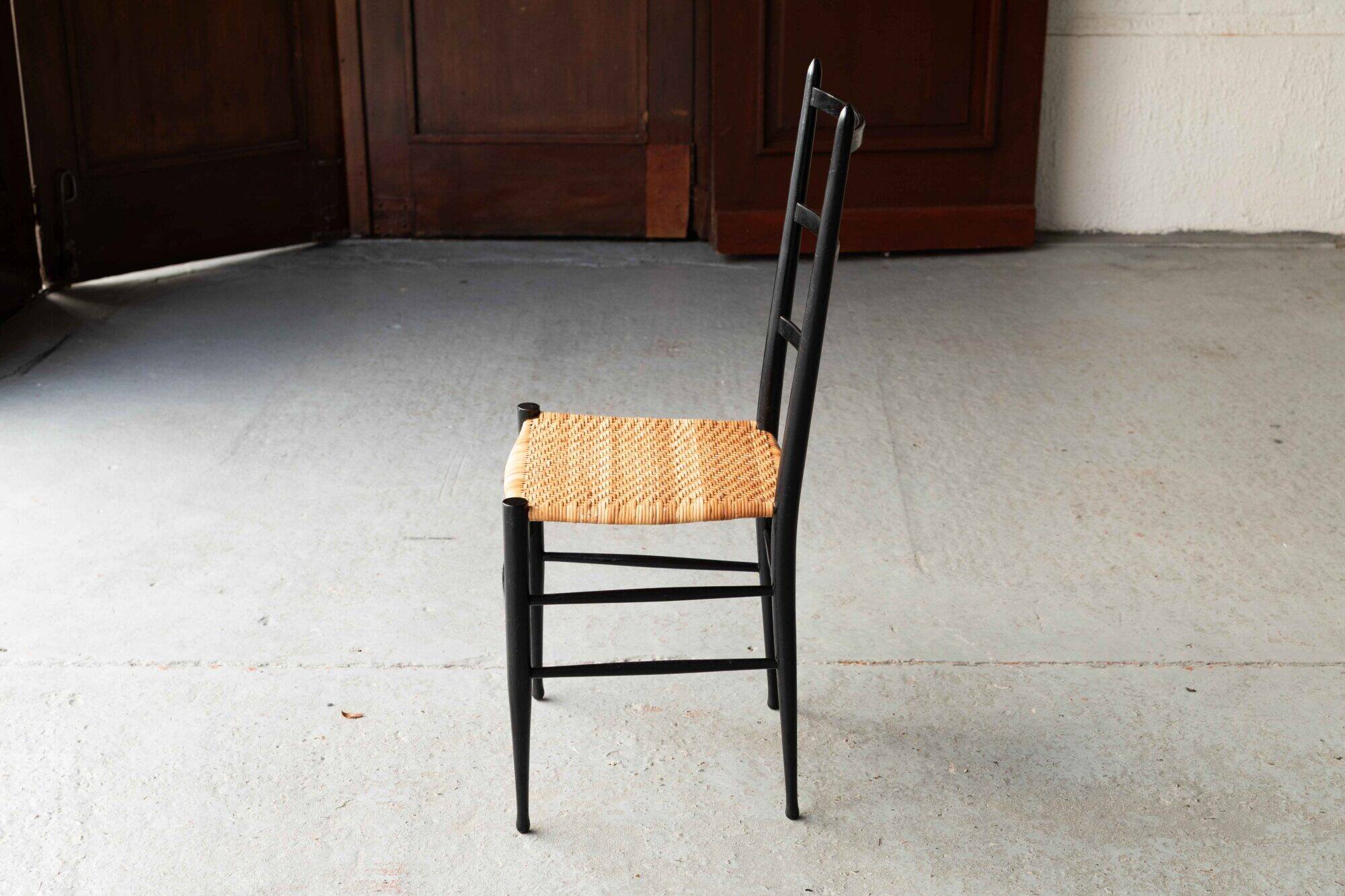 Set of 8 dining chairs ‘Baletta’ by Enrico Delmonte