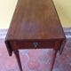 Table ancienne à volets en bois