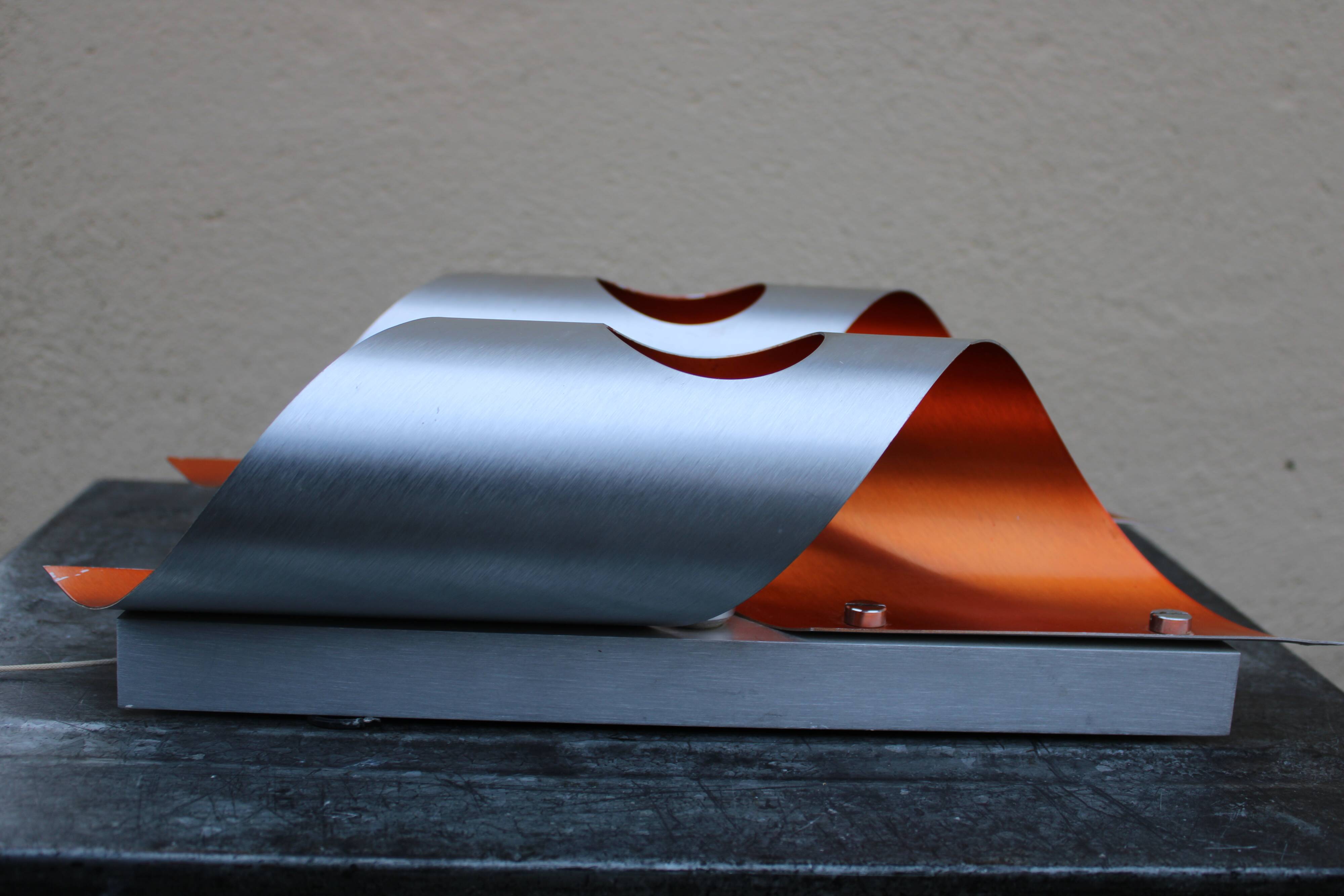 Pair of orange brushed aluminum wall light
