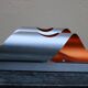 Pair of orange brushed aluminum wall light