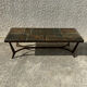 Coffee table with stone top and iron legs