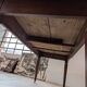 Campaign table in solid oak, Directoire style.