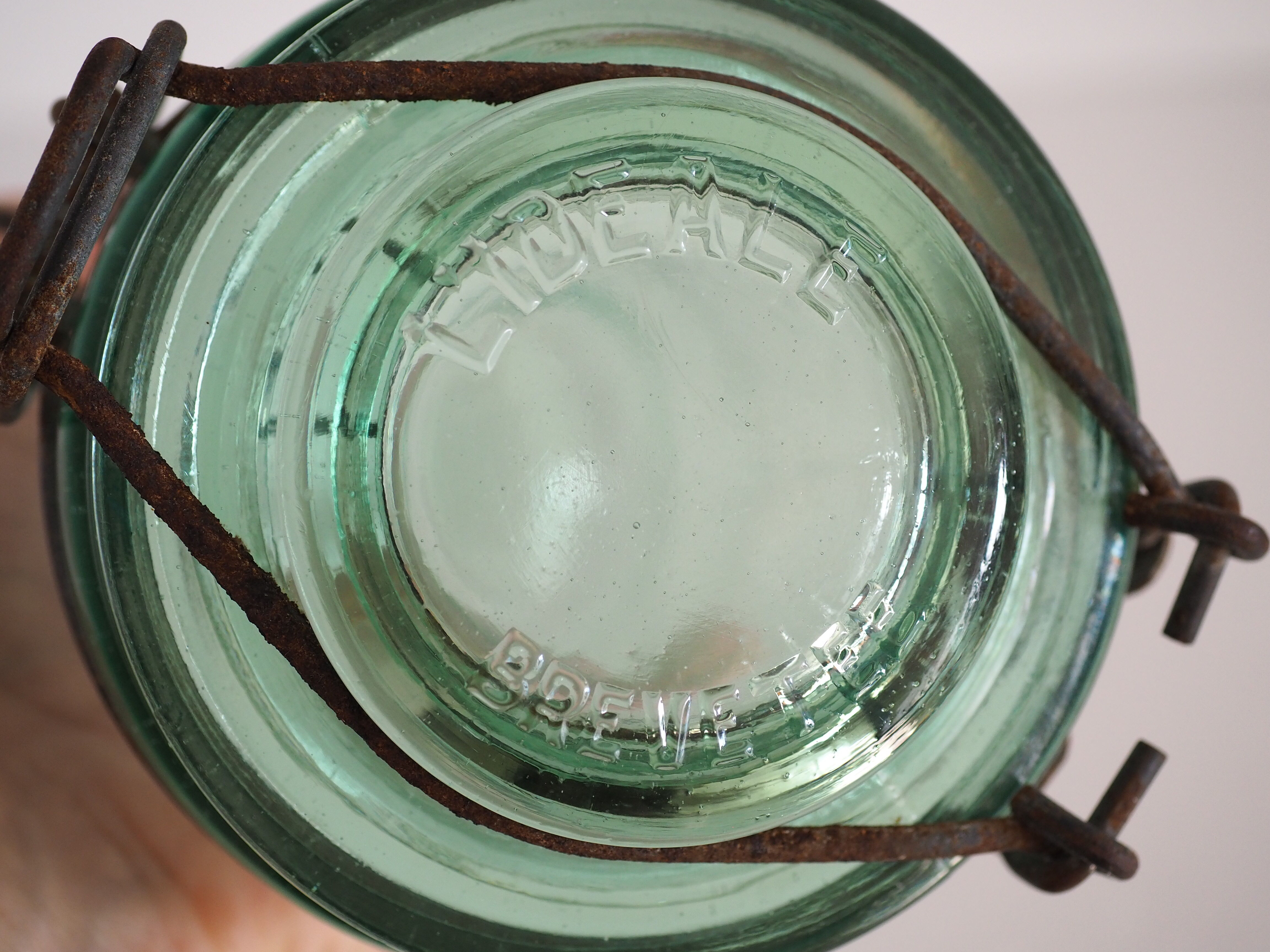 Green "ideale" glass canning jar