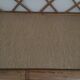 Rattan wall shelf
