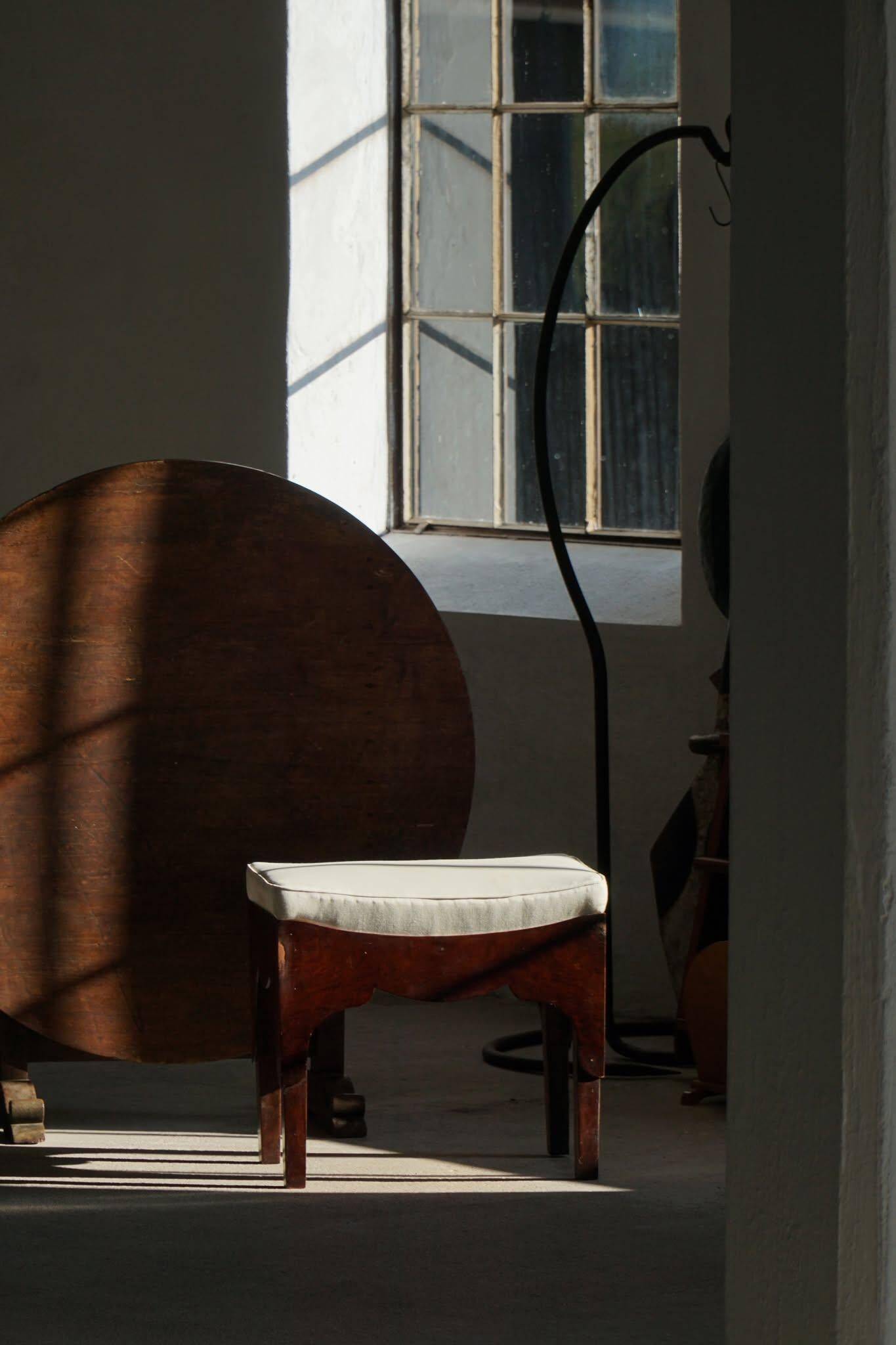 Early 20th-century mahogany vanity stool, made by a Danish cabinetmaker.