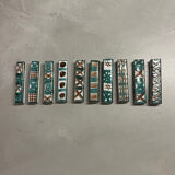 Set of 10 knife rests by Robert Picault