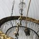 Vintage tassel chandelier has 2 glass and brass crowns