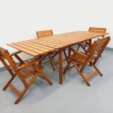 Vintage garden furniture set consisting of a table with extensions and 4 armchairs