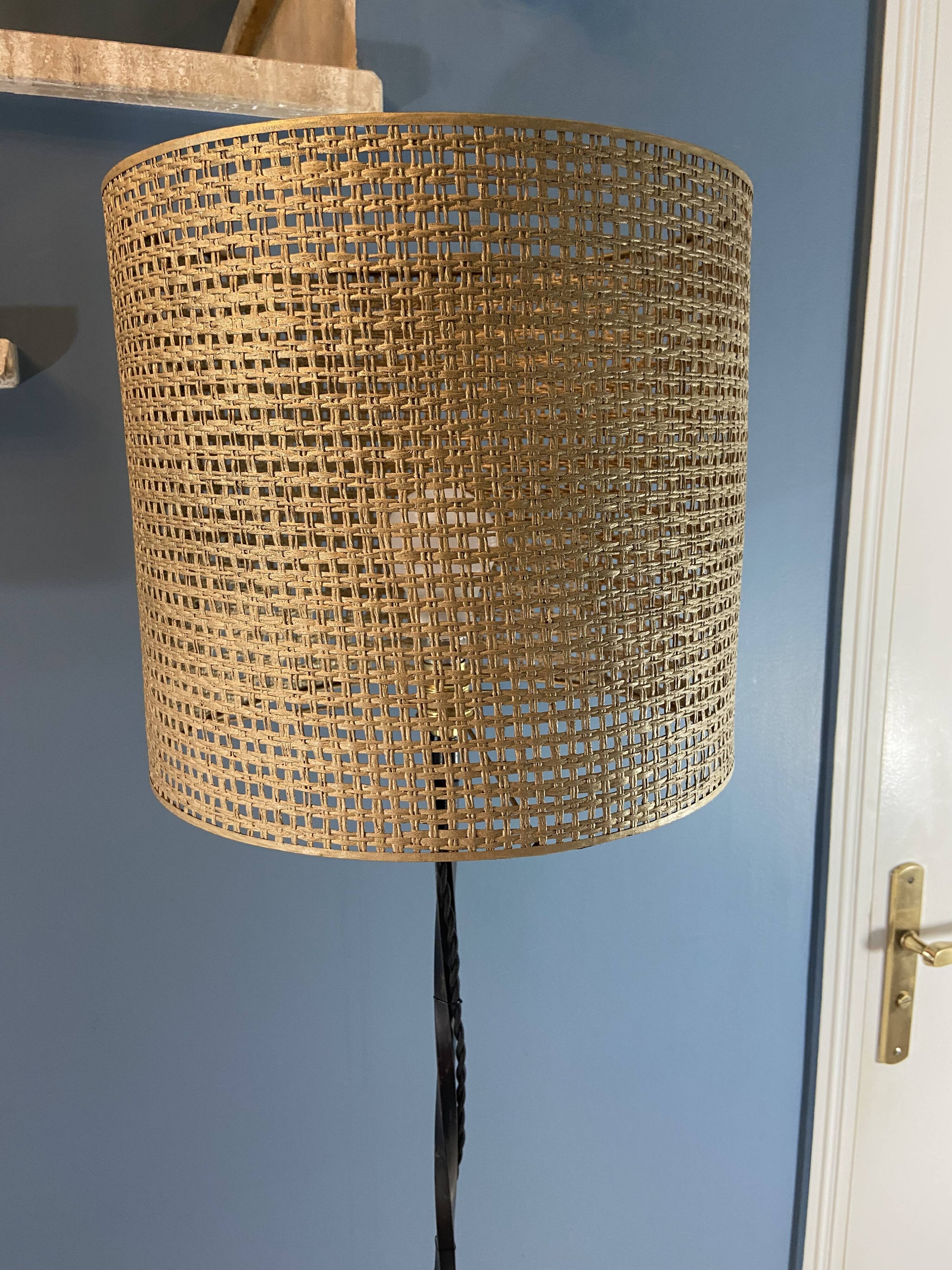 Tripod floor lamp in vintage wrought iron lampshade in cannage