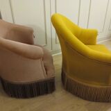 Set of 2 yellow and pink velvet tub chairs.