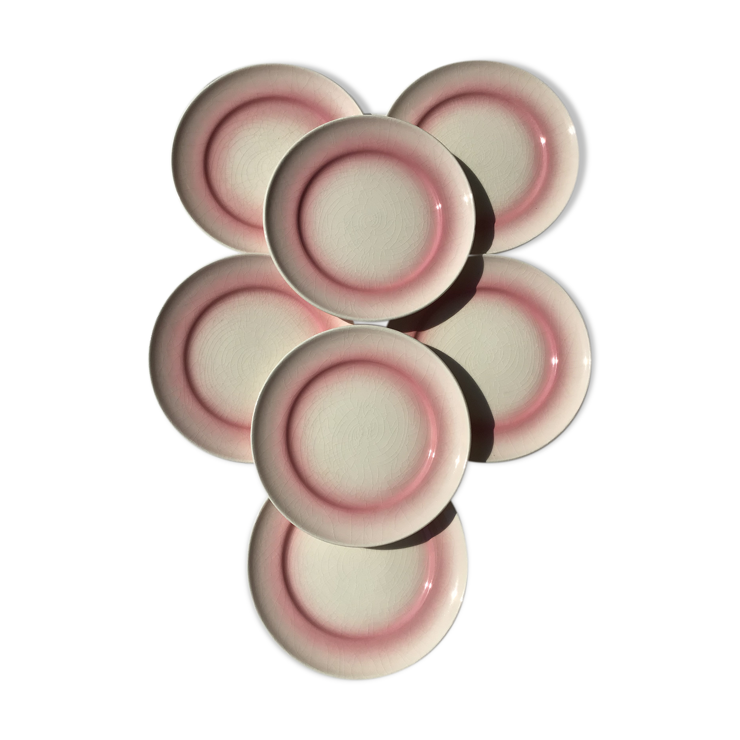 7 assiettes à dessert craquelées rose dégradé