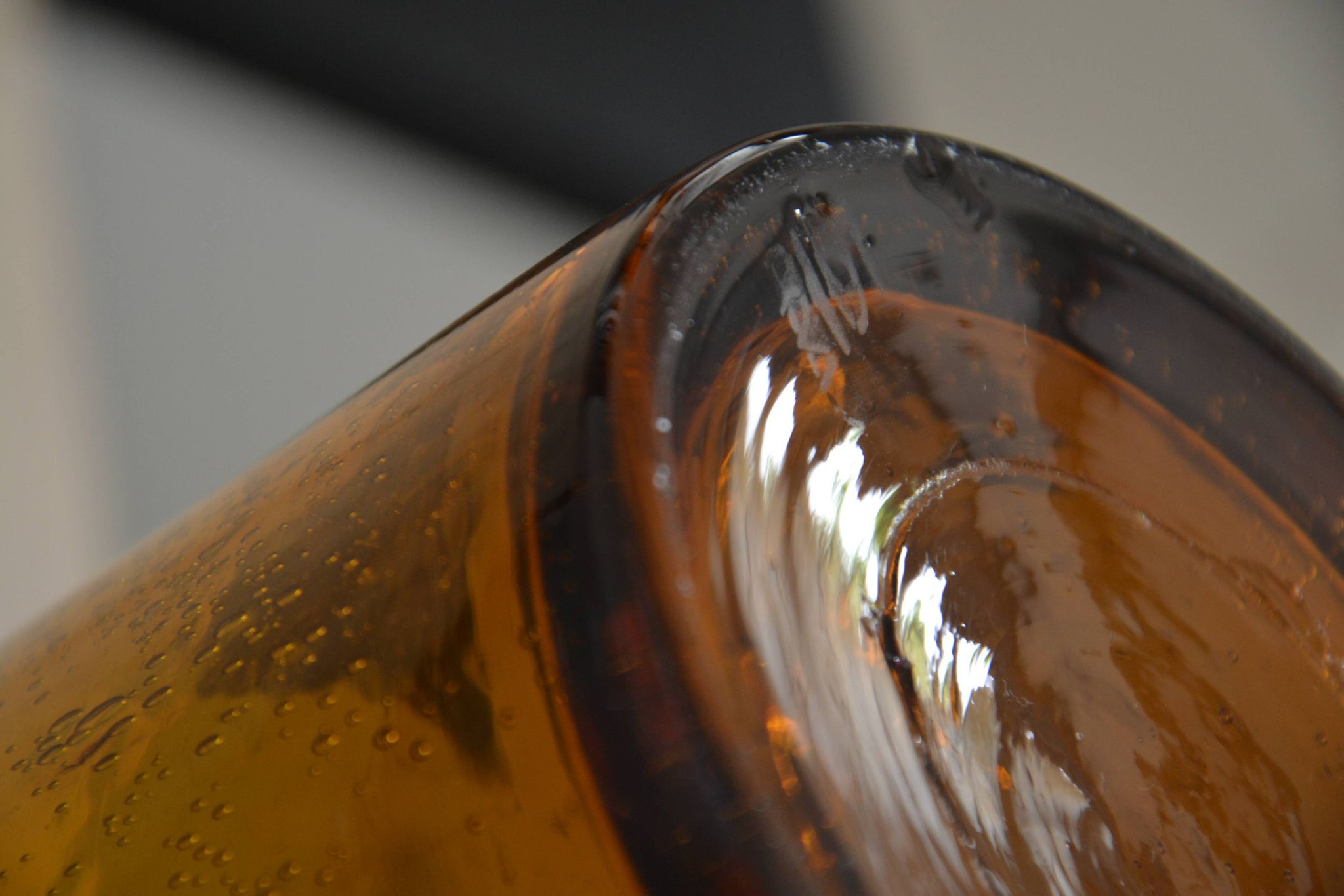 Large vase signed Biot in amber colour.