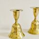 Pair of brass "bell" candle holders
