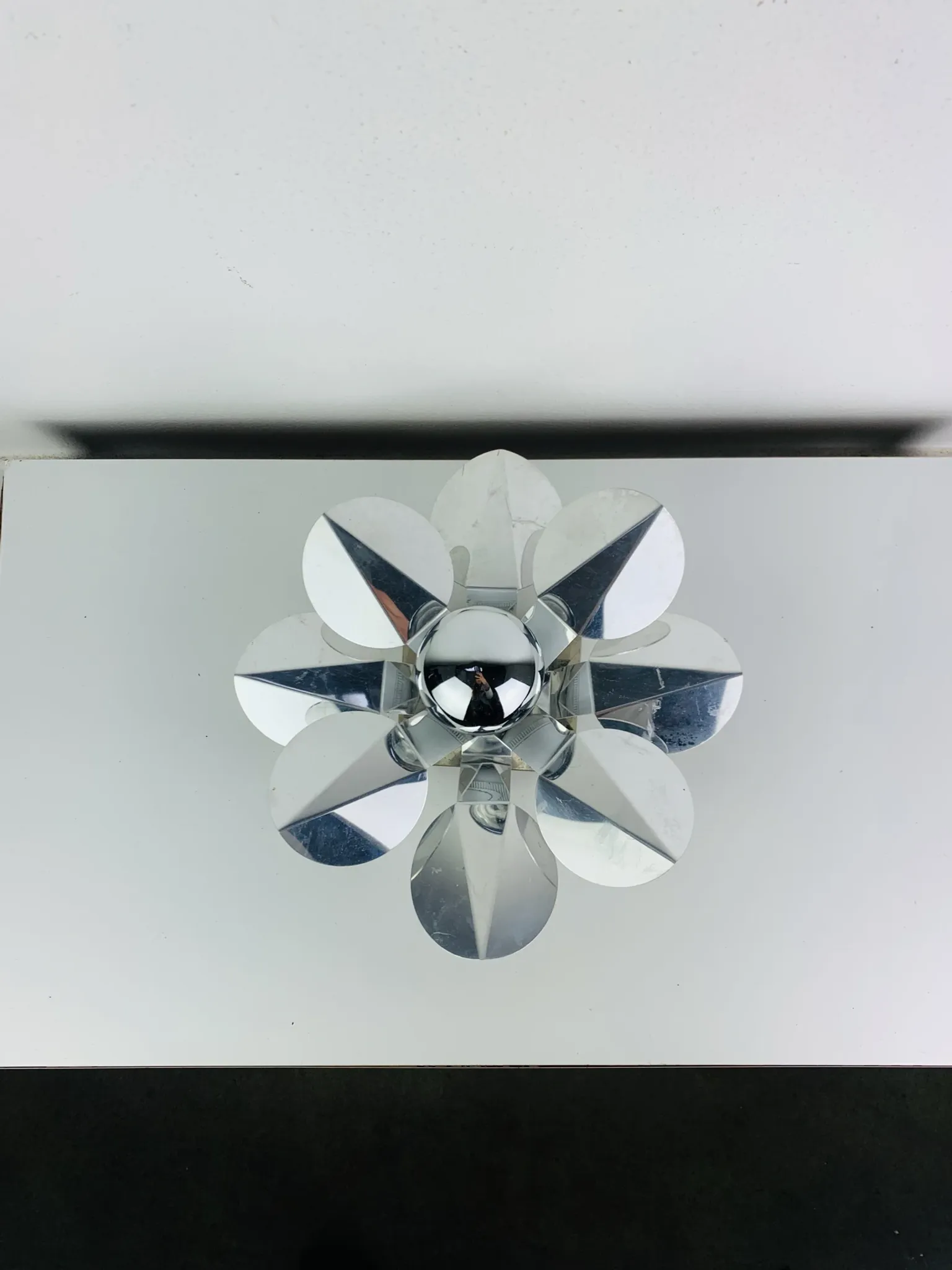 Space Age chrome flower wall light from the 1960s.