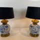 Pair of porcelain lamps with Chinese-style decorations and brass.