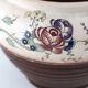 Globular ceramic vase by L. Dage, hand-painted floral decoration, style