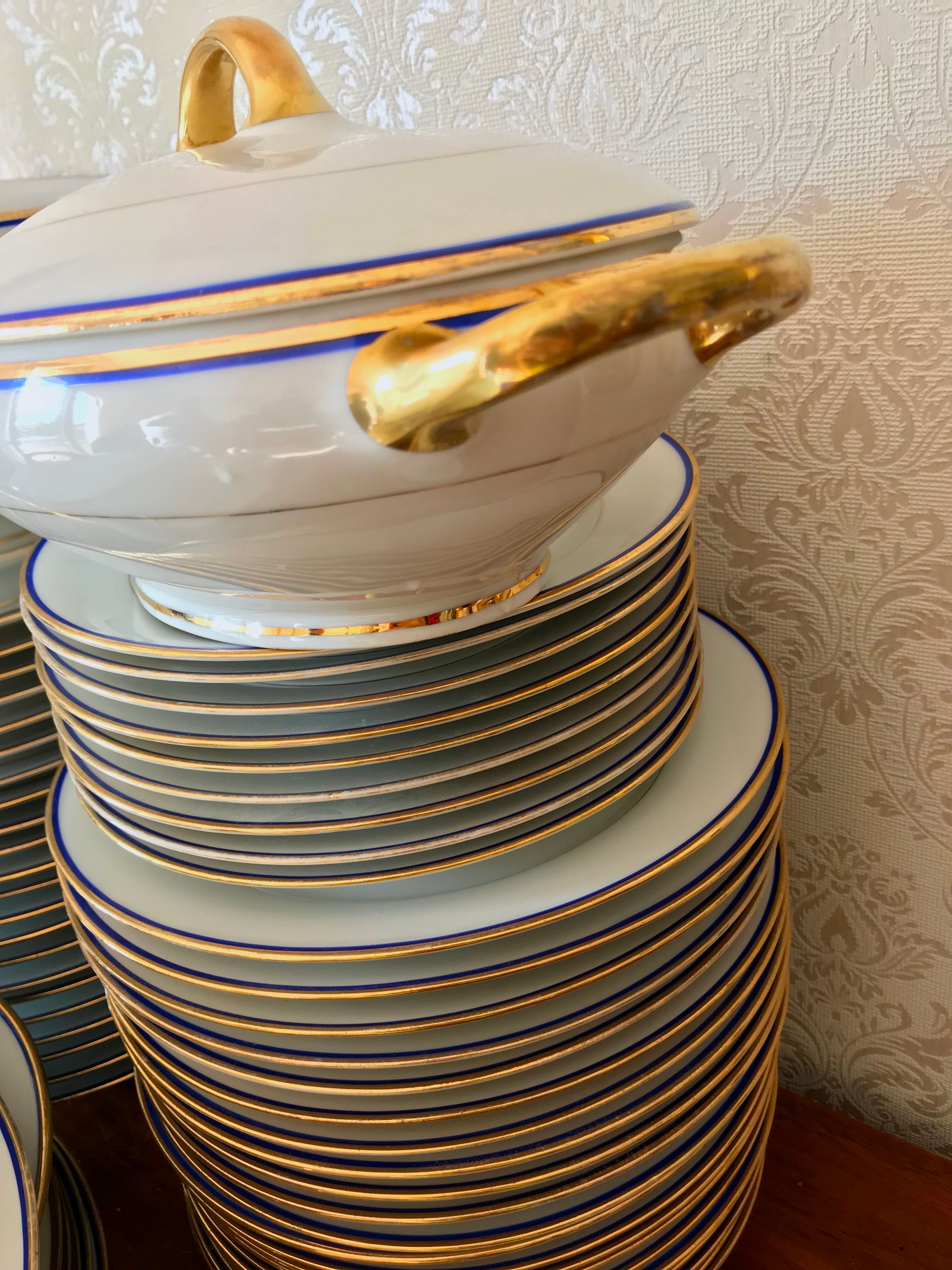table service art deco limoges porcelain white border blue and gold 61 pieces signed