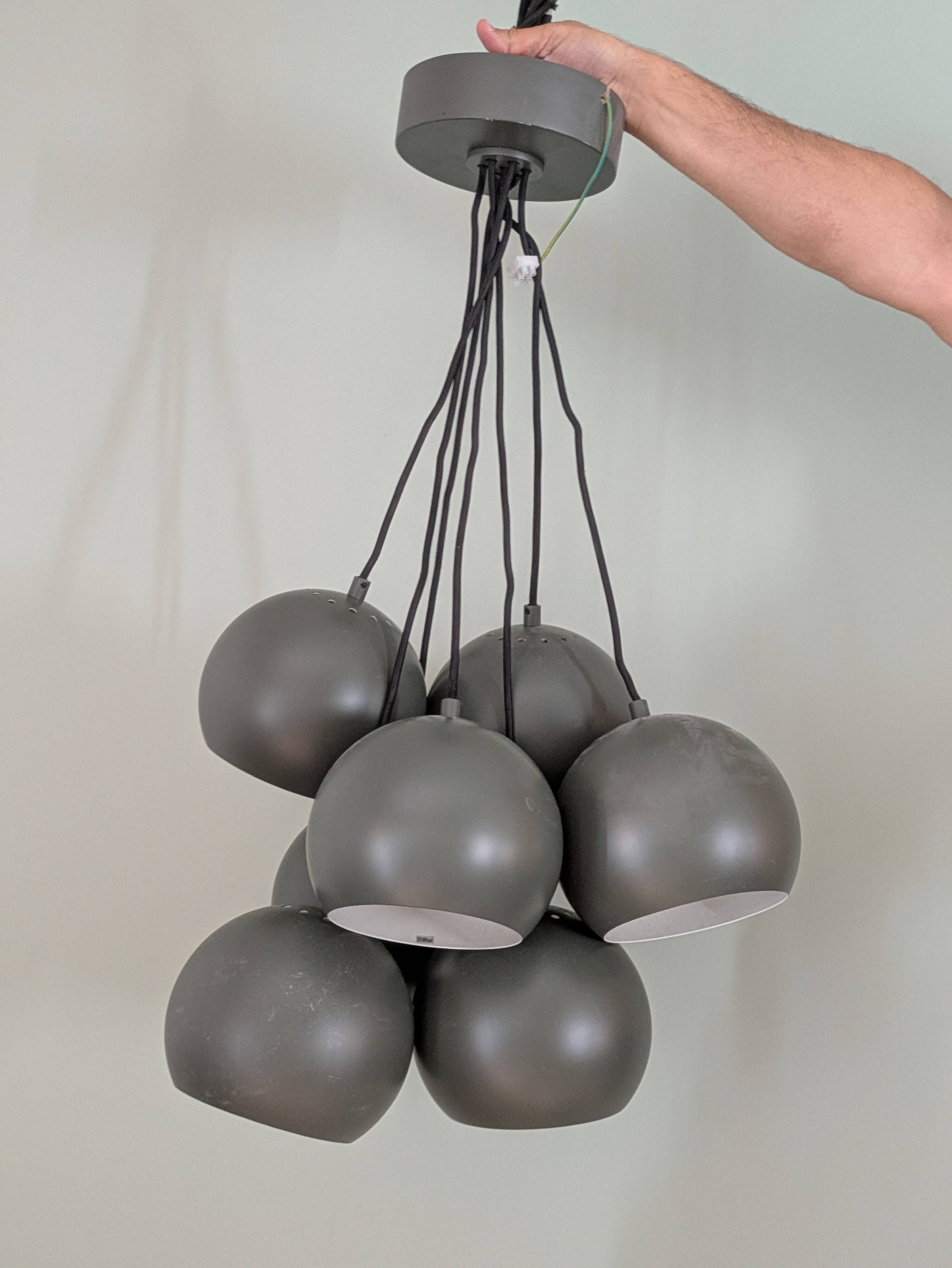 Khaki lamp with 7 bulbs.