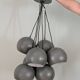 Khaki lamp with 7 bulbs.