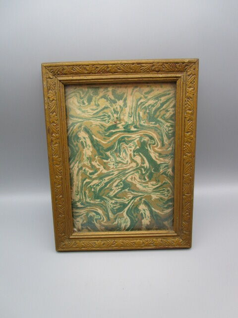 Old frame in worked wood