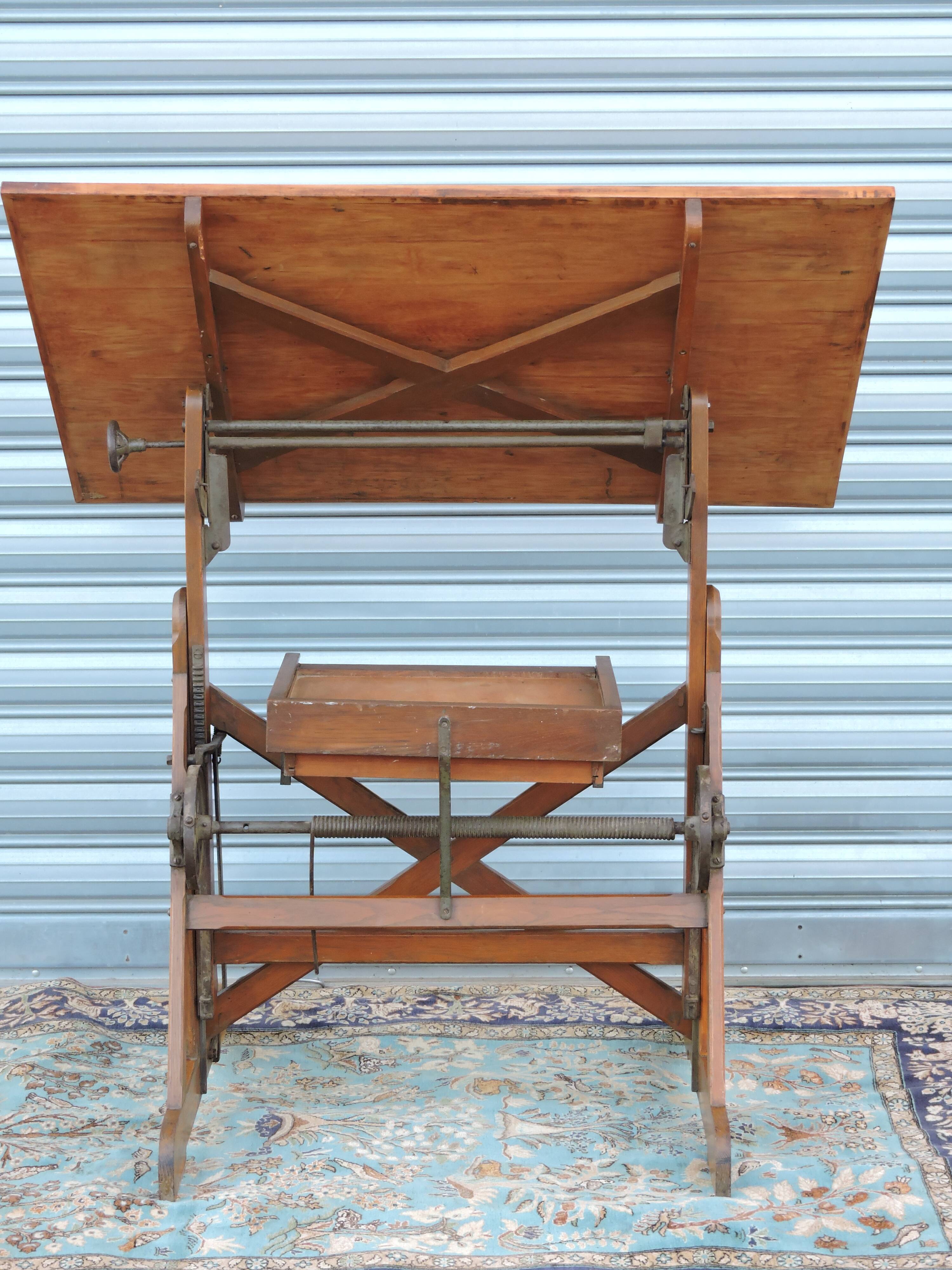 Architect's table has industrial adjustable design H Morin betting