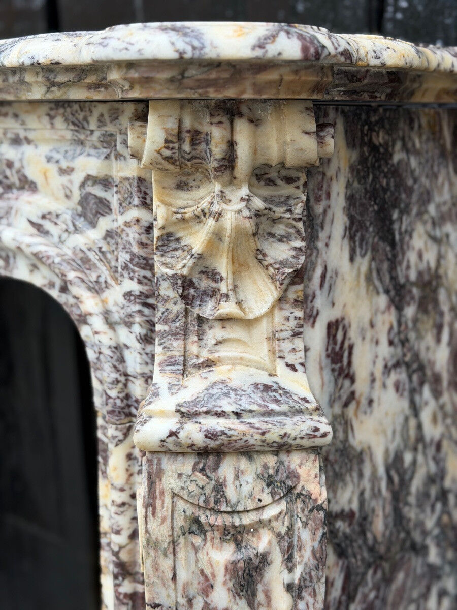 Louis XV style fireplace in Brocatelle marble, circa 1880.