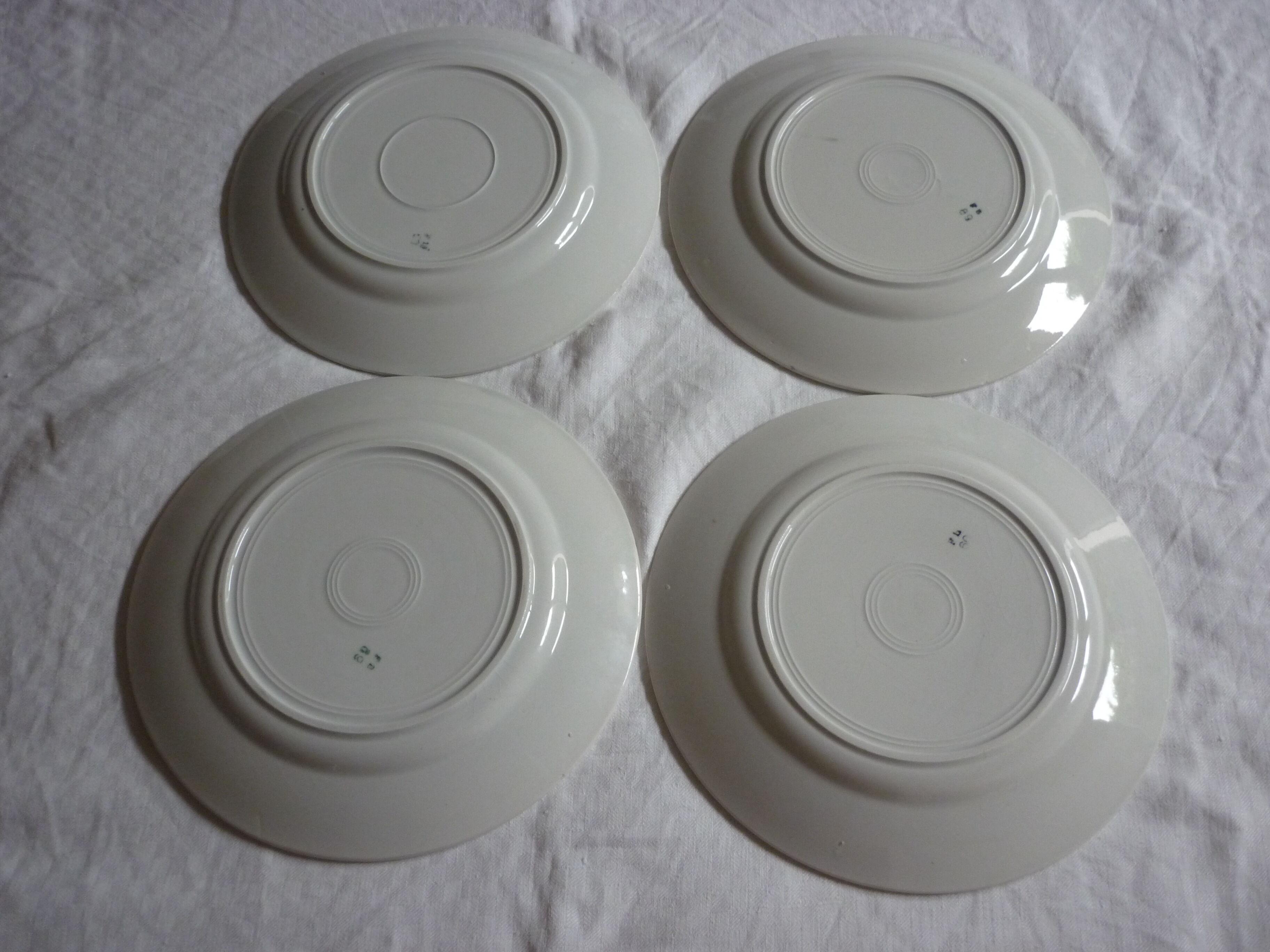 Set of 4 plates in red earthenware