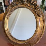 Miroir rond en bois sculpté
