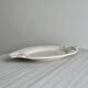 Large oval dish in sculpted white ceramic