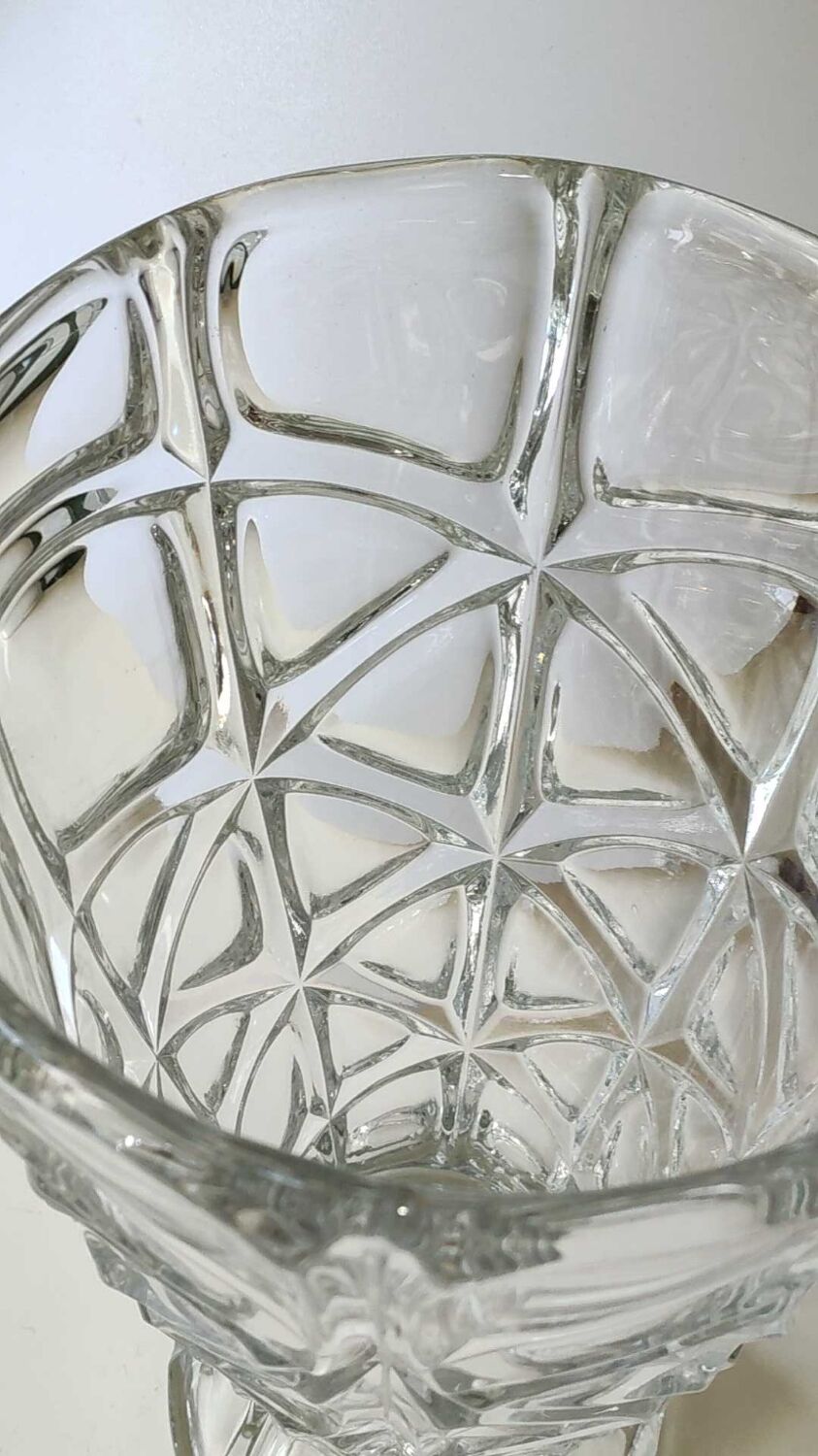 Vintage design vase in crystal. faceted patterns, braces. flared neck