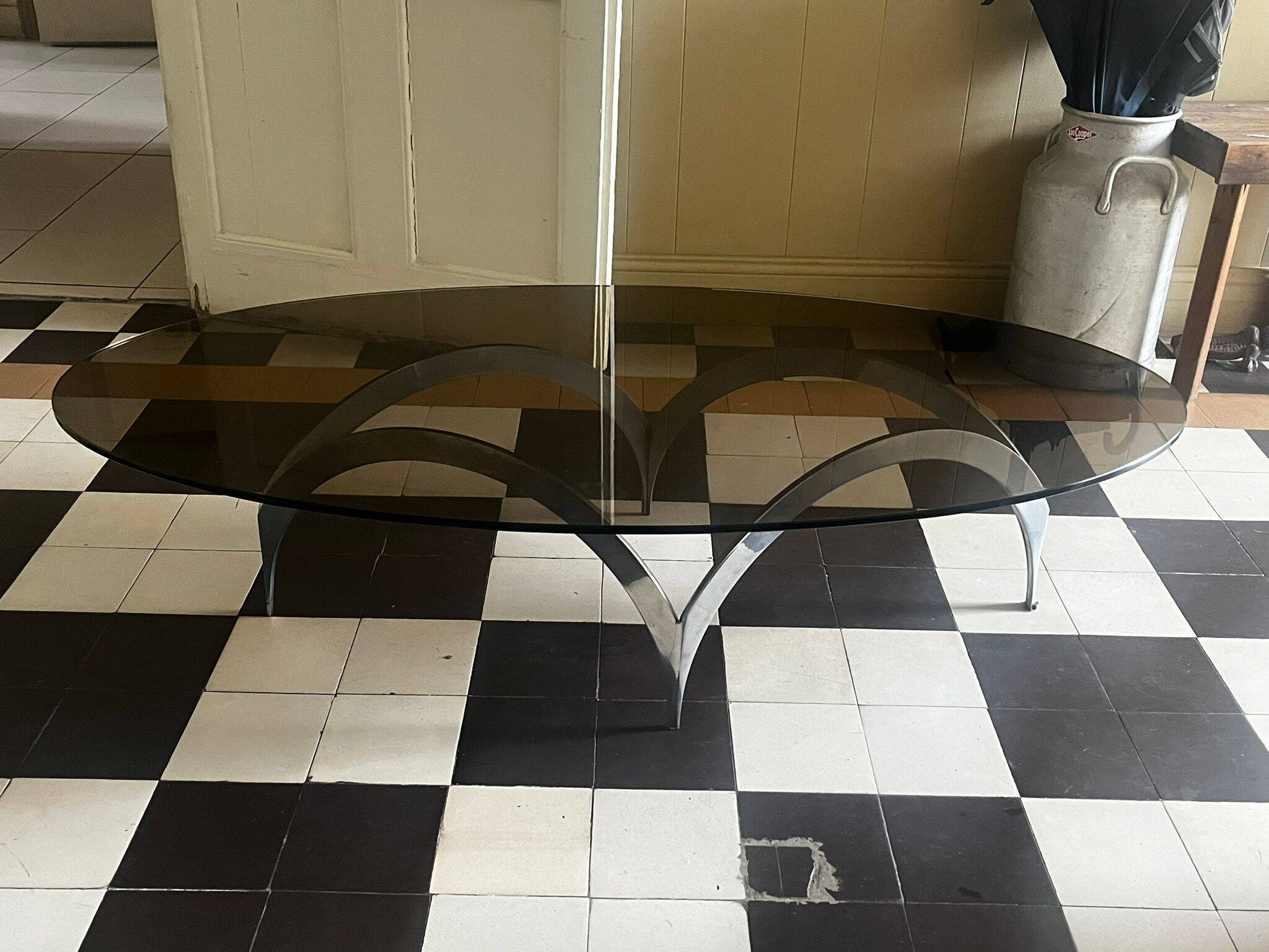 coffee table with metal legs and smoked glass top