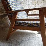 Armchair and its footrest 60s