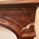 Pair of Louis XIV style fireplaces in red cherry marble. XIX century.