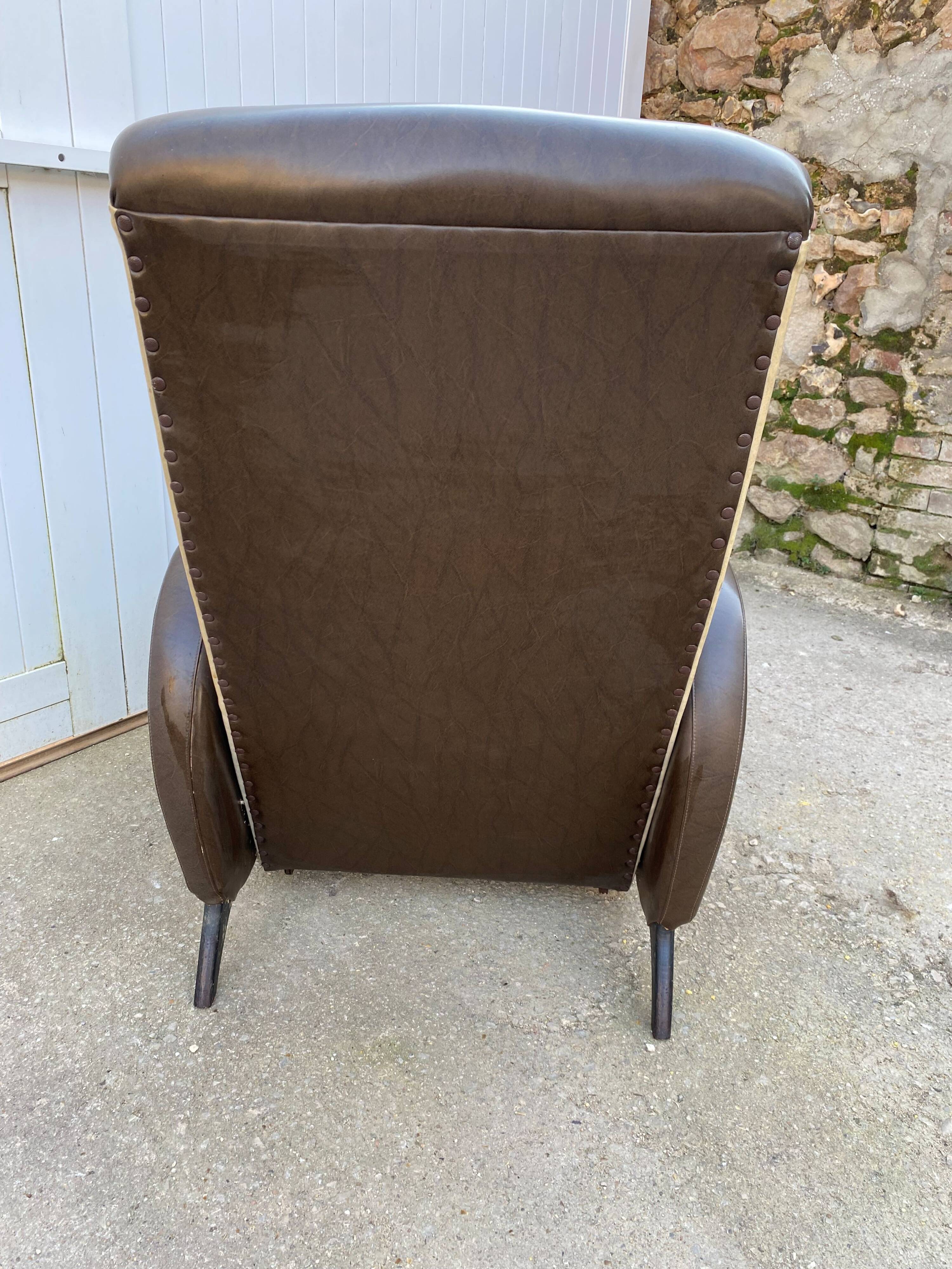 Vintage 50 faux leather reclining lounge chair with footrest