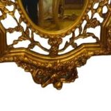 Oval gilded mirror