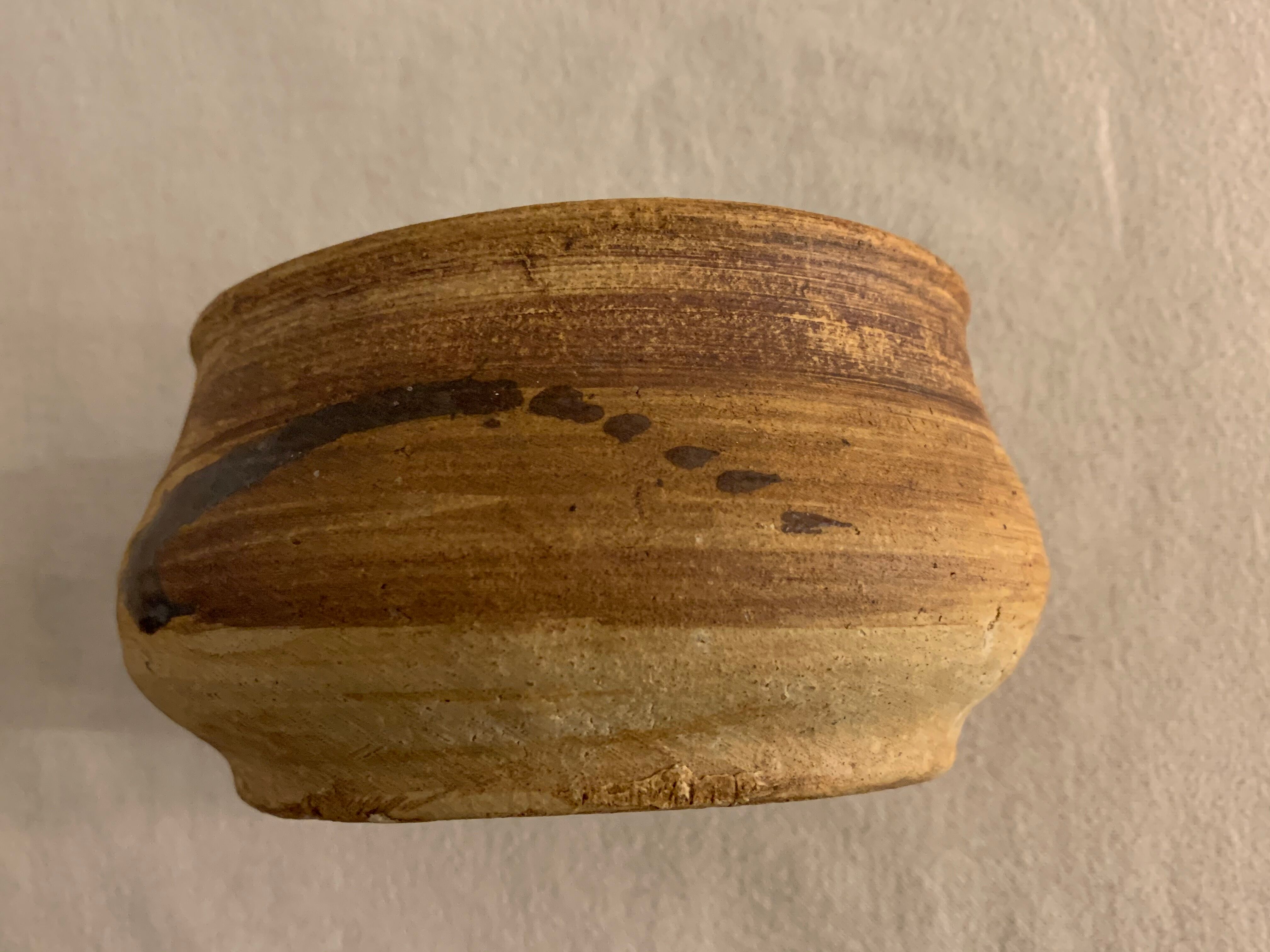 Ancient pot and its lid Pottery of the Dove in sandstone 1975