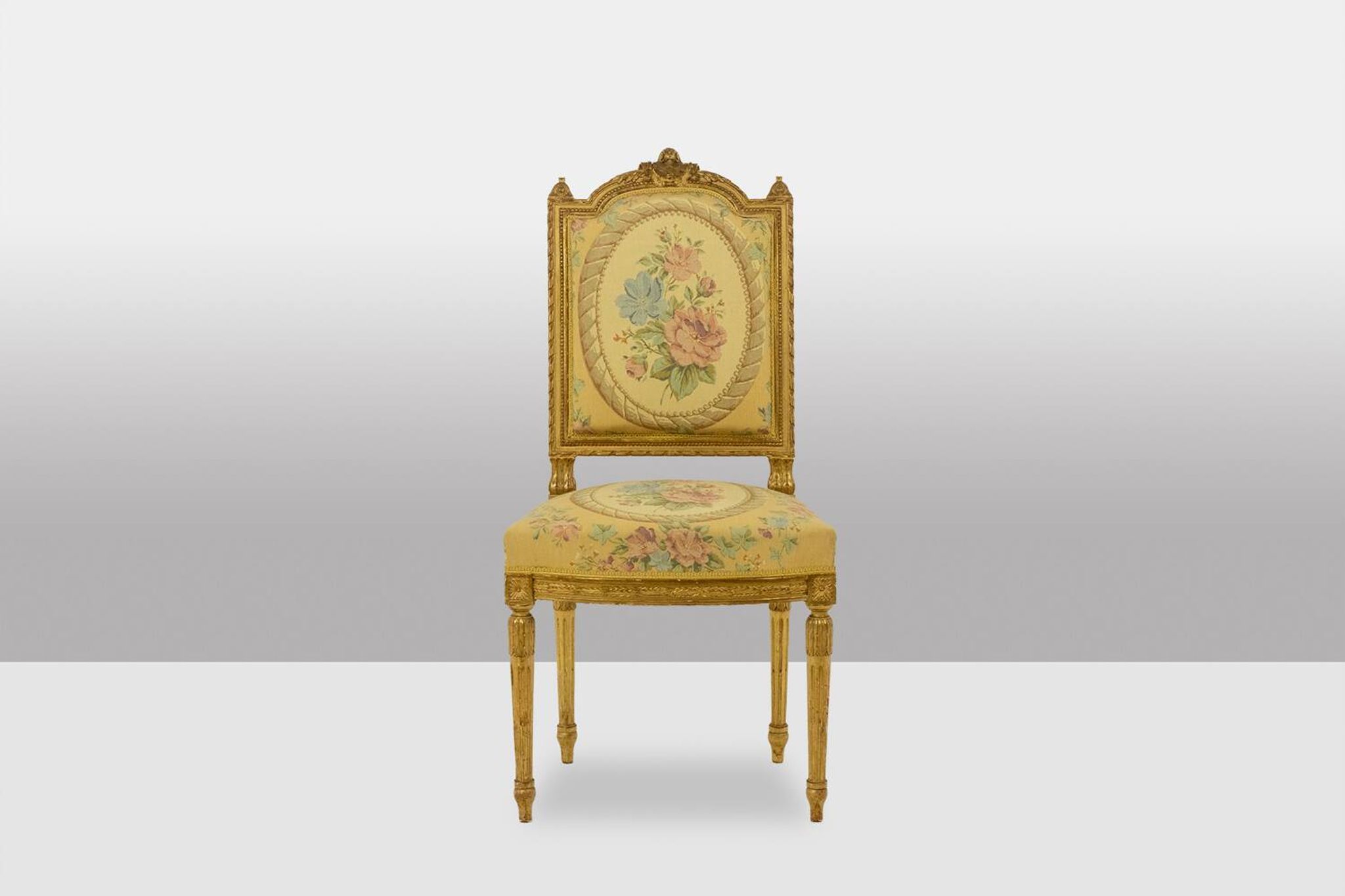 Pair of gilded wooden chairs with upholstery. Louis XVI period.