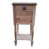 Raw wood bedside table