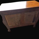 Solid wood commode in an antique style.