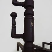 Large pair of wrought iron fireplace andirons. France, 19th century.