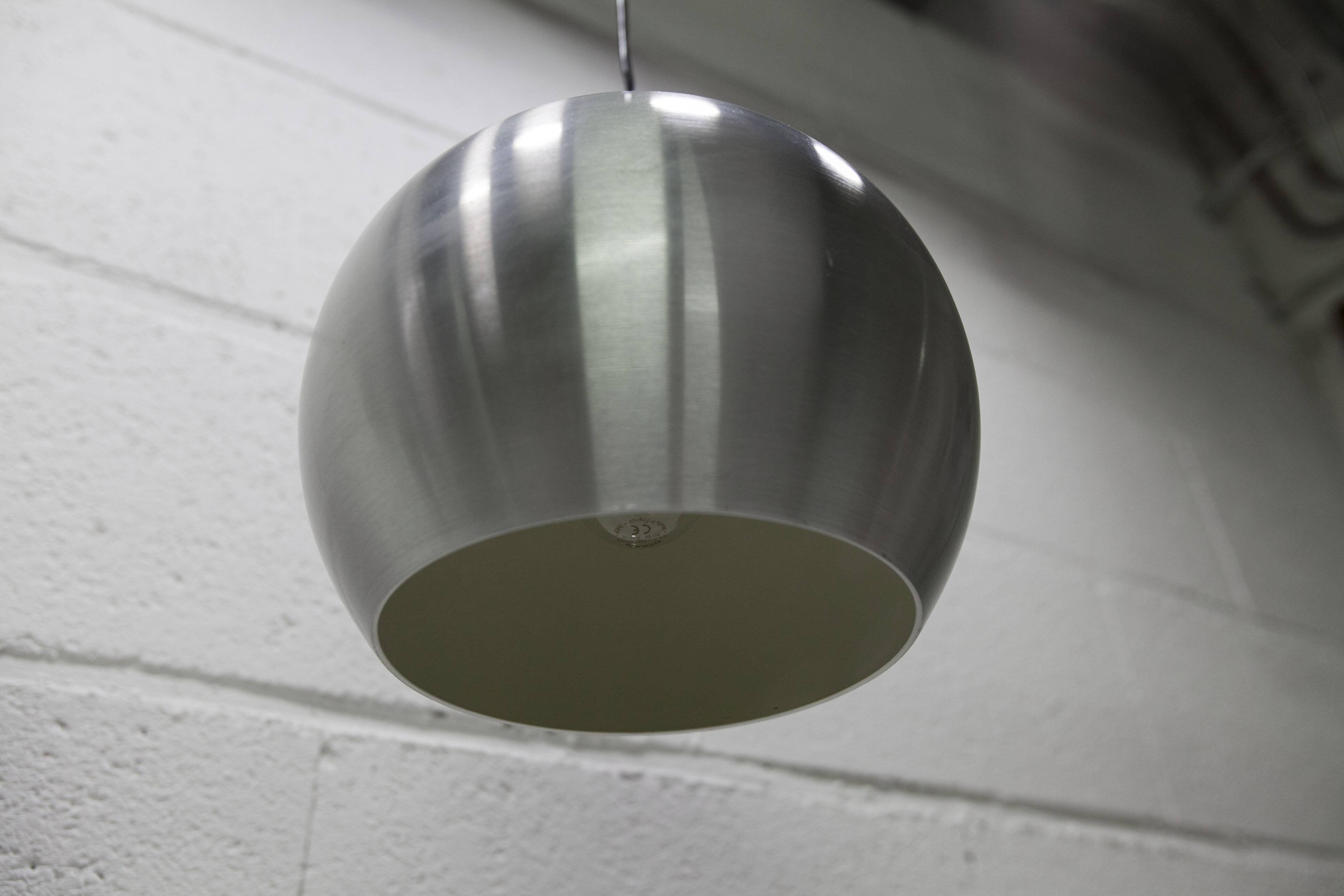 Pair of functional 70's aluminum ball pendants