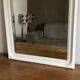 Antique mirror with a gendarme hat shape. White. 72x56.