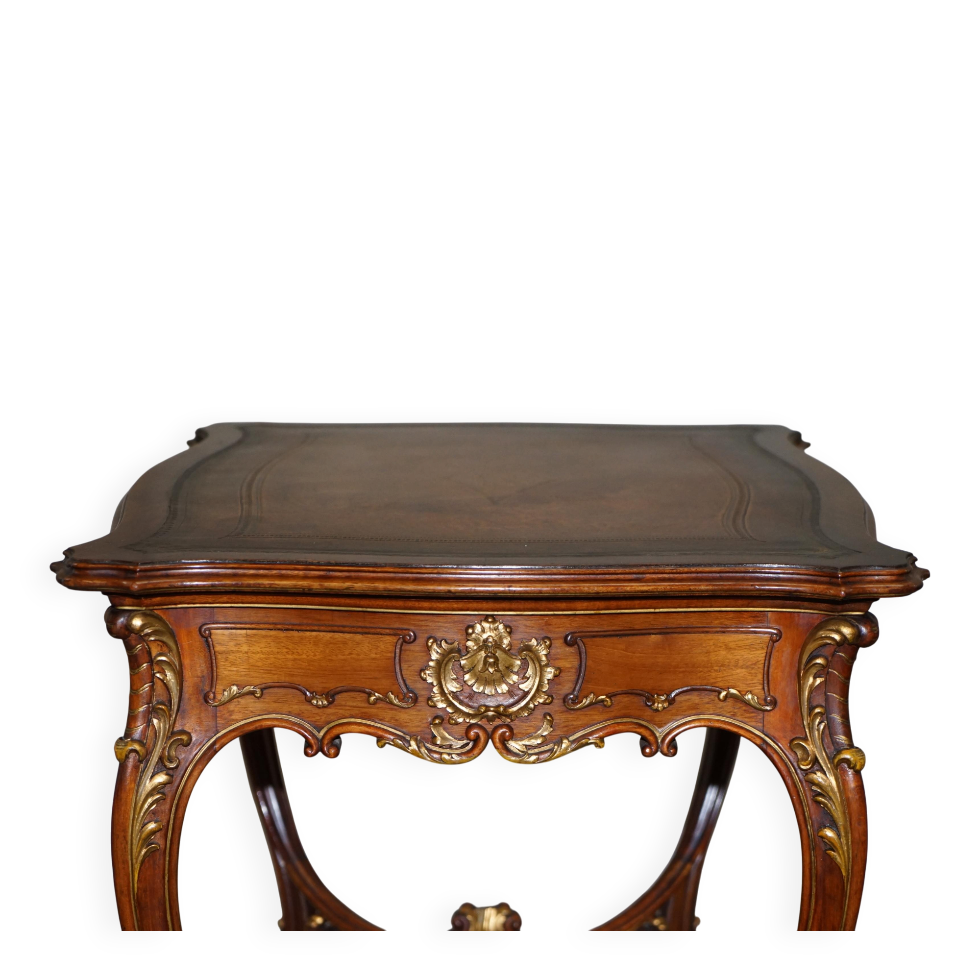 Pine desk with leather and gilding, late Victorian period around 1900.