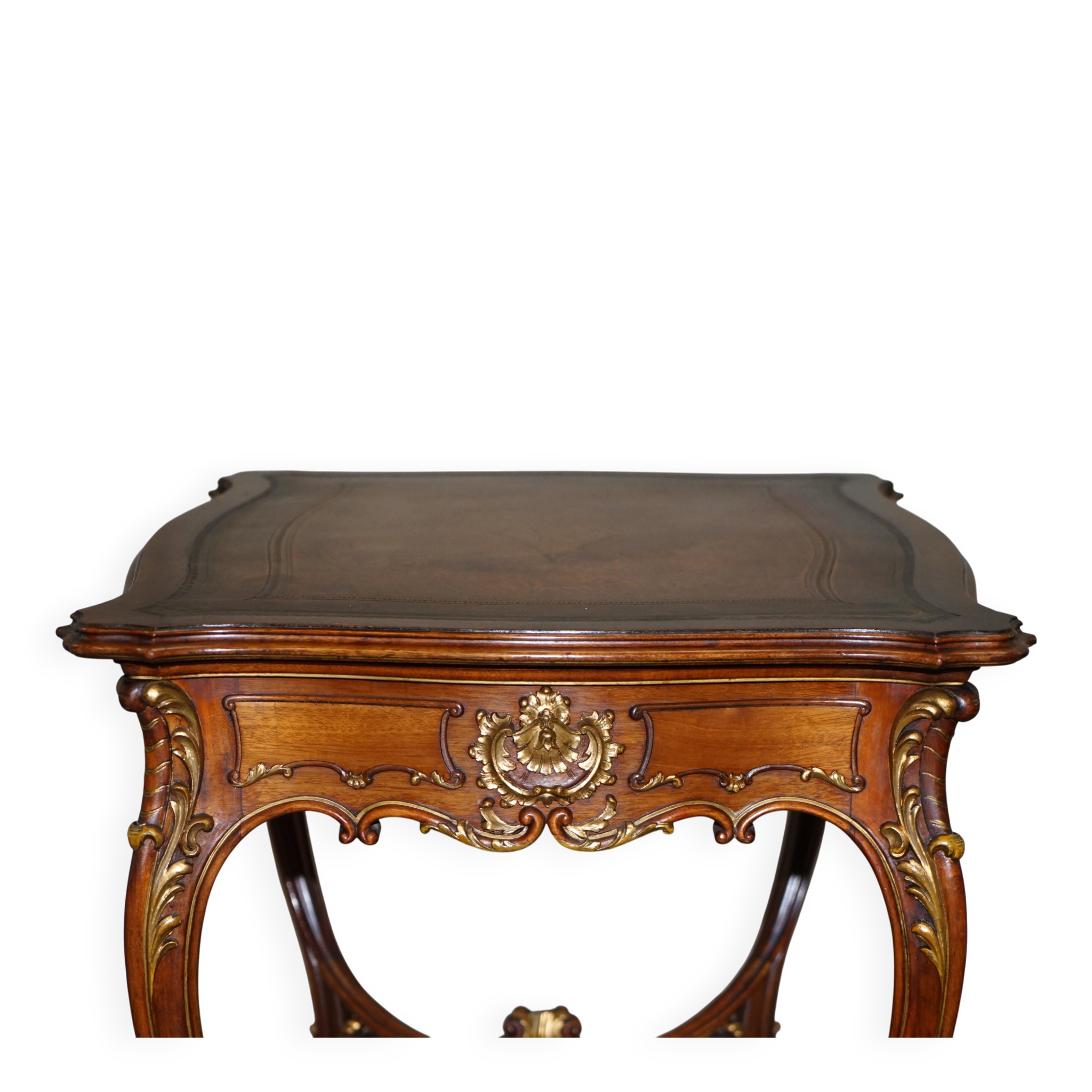 Pine desk with leather and gilding, late Victorian period around 1900.