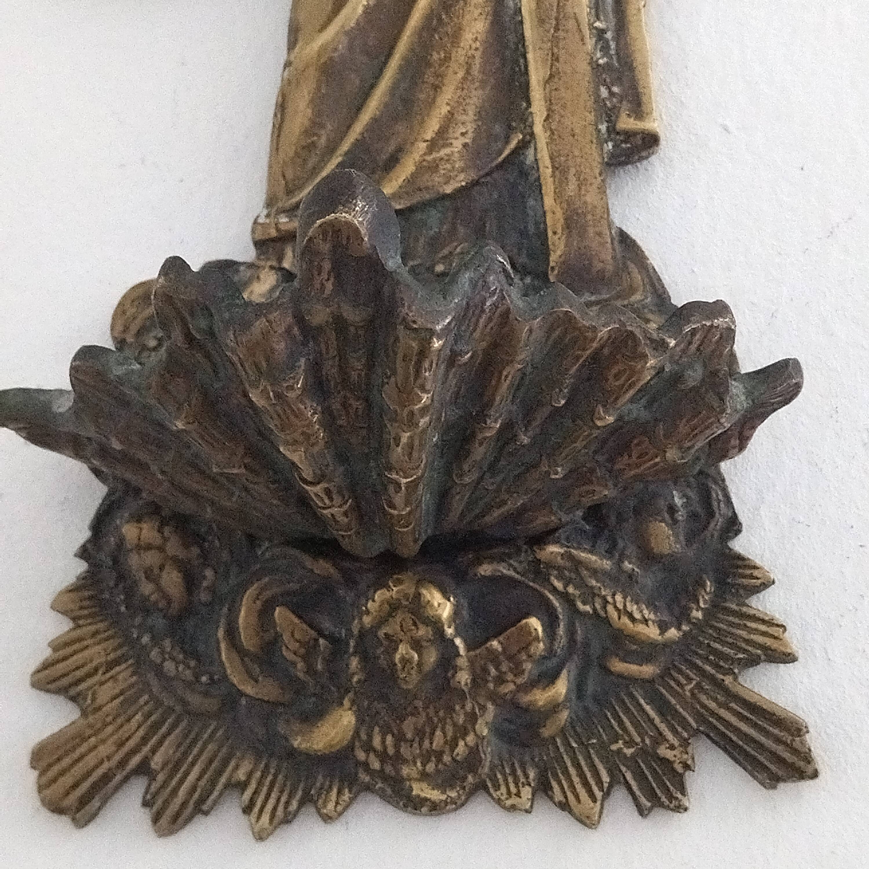 Antique bronze holy water font