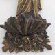 Antique bronze holy water font