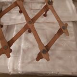 Extendable wall coat rack