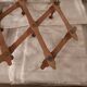 Extendable wall coat rack
