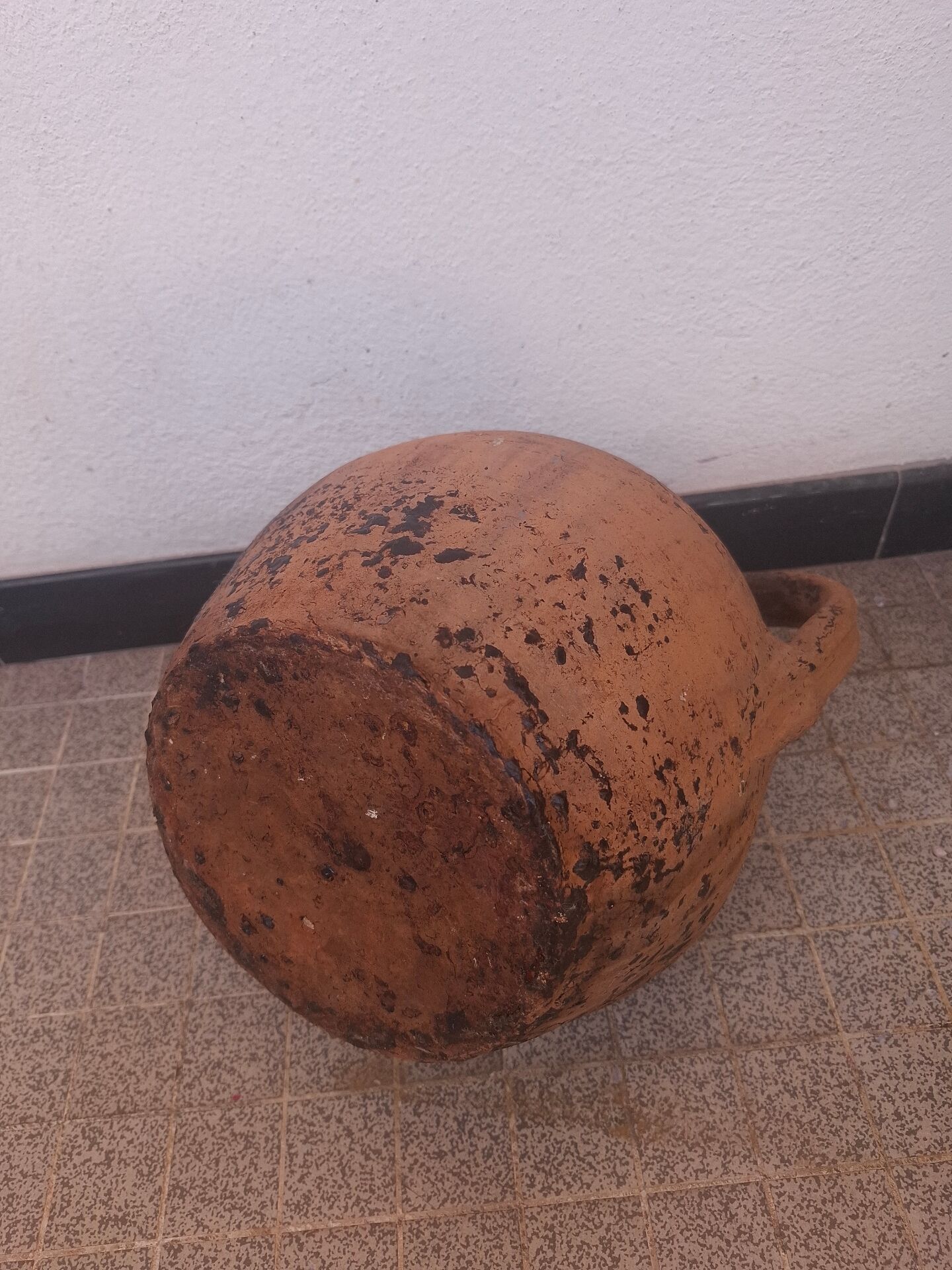 Jug, I stop at glazed terracotta oil.